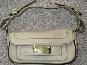 Small Beige handbag.